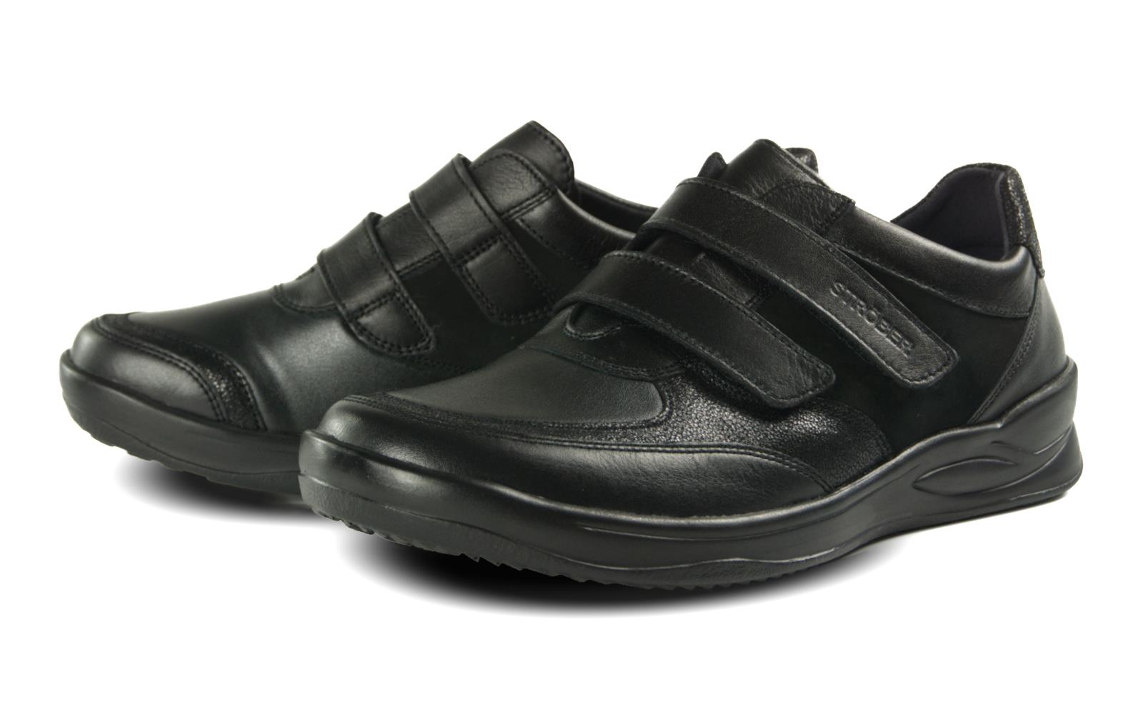 Schwarze KOKO Nappa + StretchPerlato Schuhe, elegant positioniert auf einem hellen Untergrund, mit glatter Oberfläche und stilvollem Design.