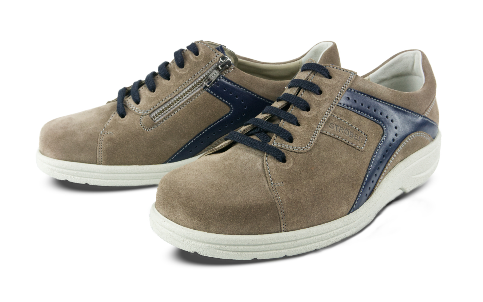 Der MALIO Velour Schuh in erde und marine steht in seitlicher Ansicht auf einem hellen Untergrund.