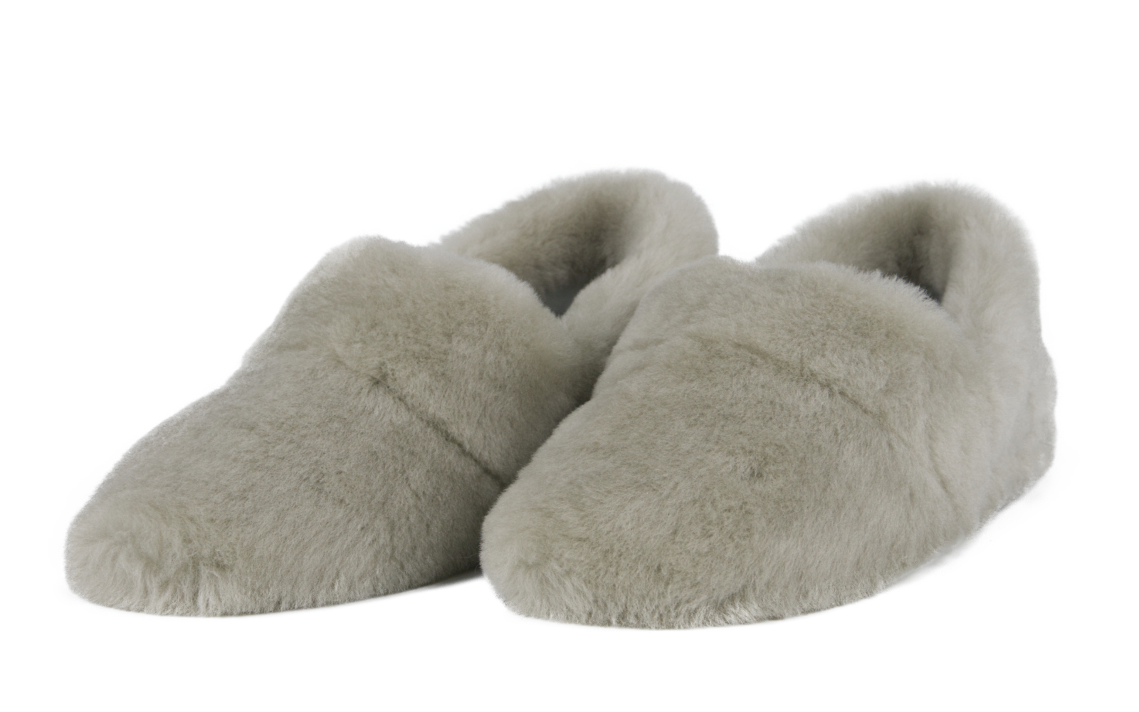 Der Schuh TESSA Lammfell in Paloma zeigt ein elegantes Design mit weichem Obermaterial und einer bequemen Sohle, perfekt für kalte Tage.