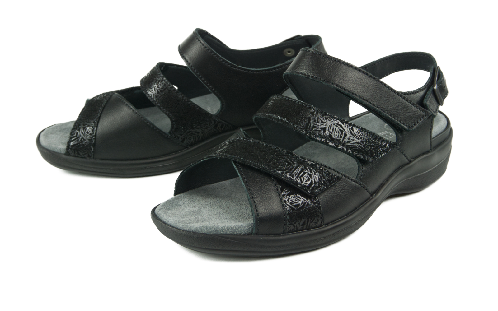 HEDWIG Nappa+VelourStruktur in schwarz HEDWIG Nappa+VelourStruktur in schwarz, elegant platziert auf einer neutralen Oberfläche, zeigt die feine Textur und das ansprechende Design.