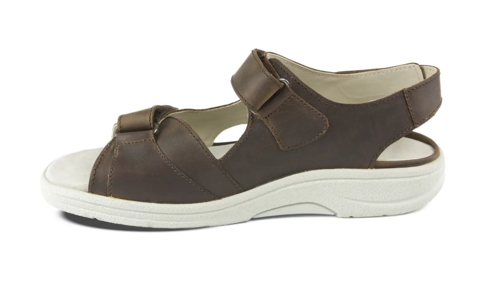 MALIK Nubuk in ebony Der MALIK Nubuk Schuh in Ebony wird seitlich auf einem neutralen Hintergrund präsentiert, mit hellen Akzenten und hochwertiger Verarbeitung.