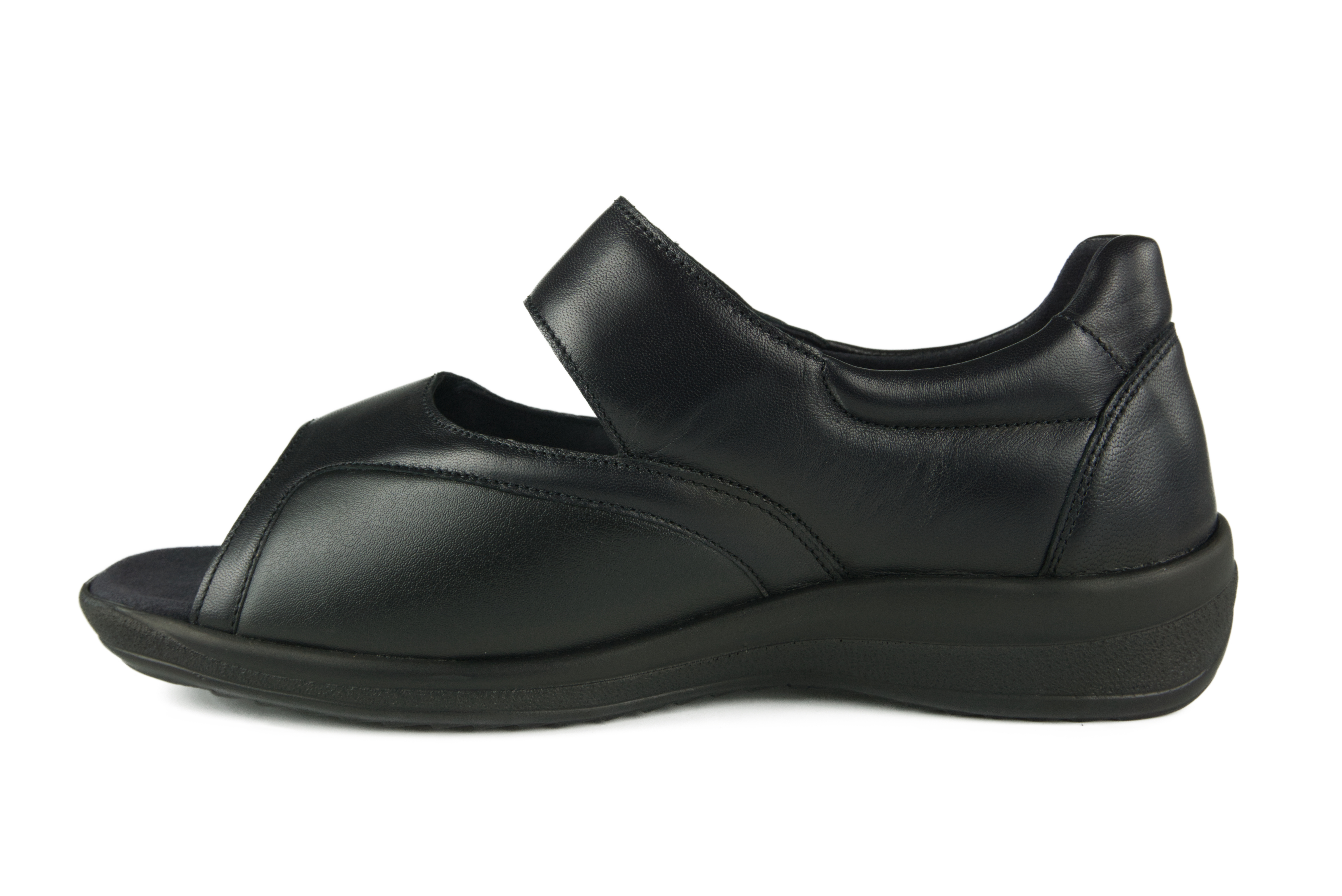 Ein eleganter HONEY LammNappa+StretchNappa Schuh in Schwarz, seitlich positioniert auf einem neutralen Hintergrund.