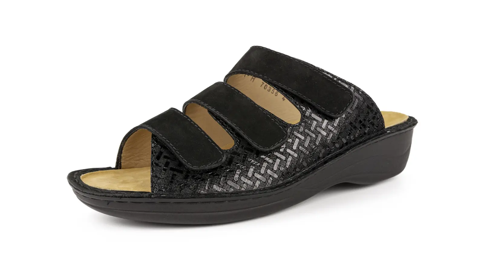 Schwarze IRIS Schuhe aus NubukVelour mit Anti-Rutsch-Pads, auf einem hellen Hintergrund angeordnet.