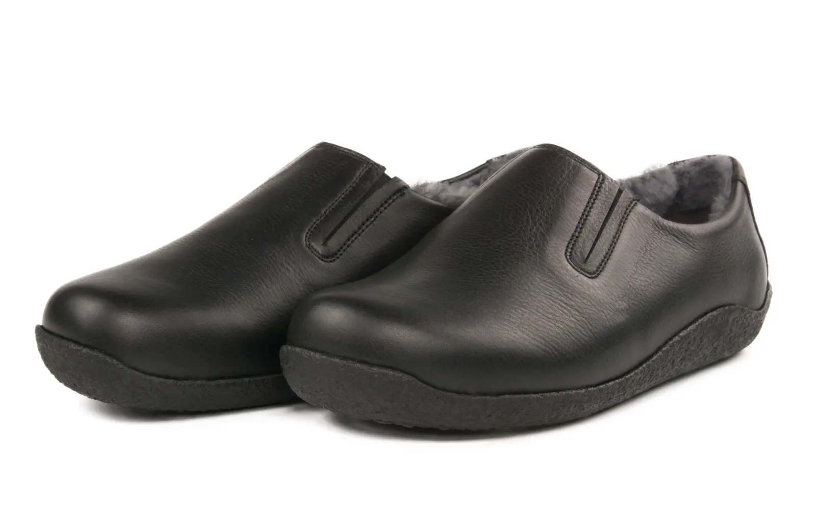 Schwarze VANISA NappaSoft Schuhe mit Lammfellfutter, elegant positioniert auf einer hellen Oberfläche. Ideal für Komfort und Stil.
